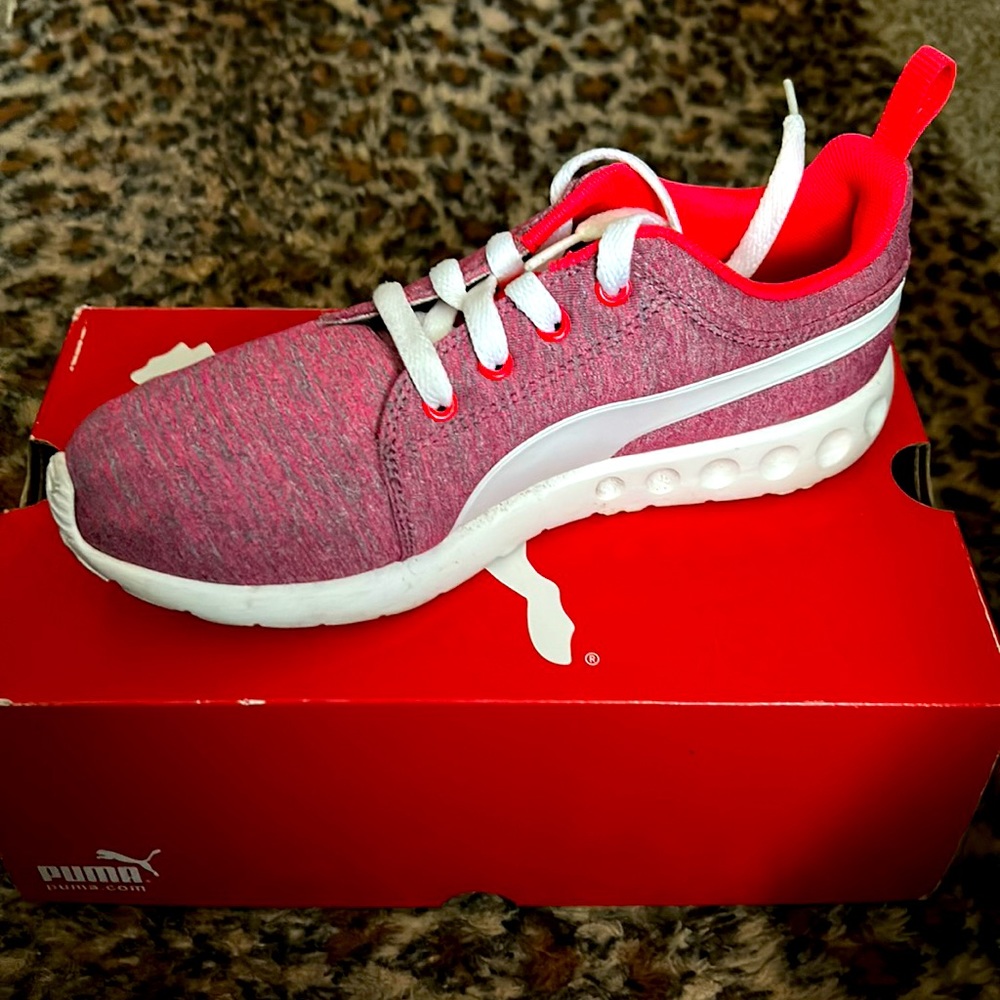 Cute pink and white pumas